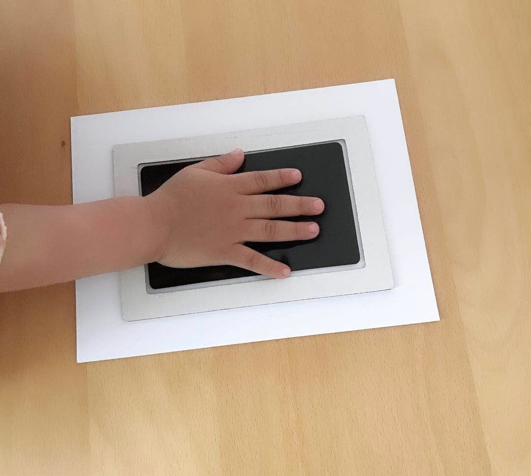 Baby hands and feet with oil