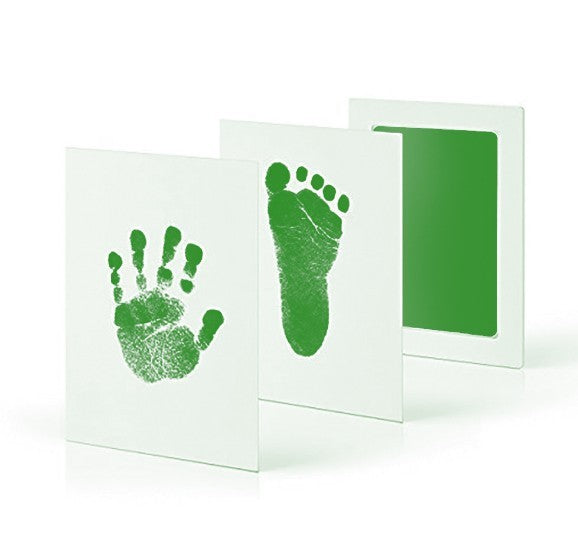 Baby hands and feet with oil