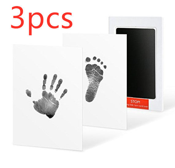 Baby hands and feet with oil