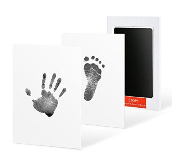 Baby hands and feet with oil