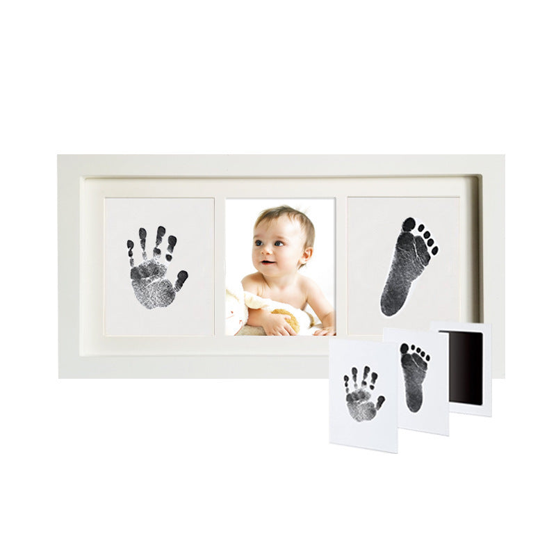 Baby hands and feet with oil