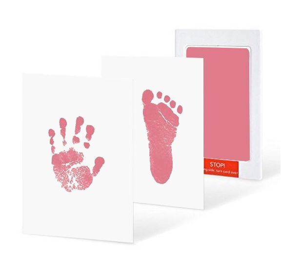 Baby hands and feet with oil