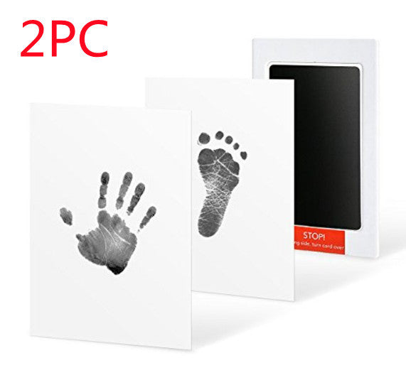 Baby hands and feet with oil