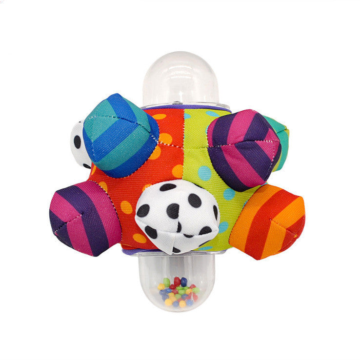 Baby hand catching rattle ball