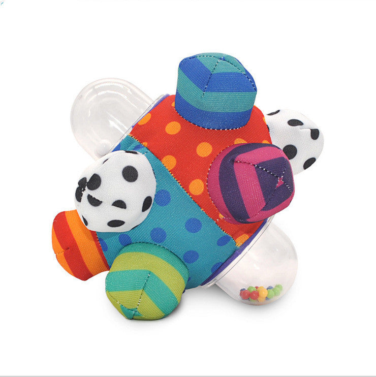 Baby hand catching rattle ball