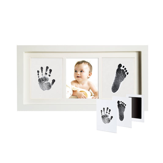 Baby hands and feet with oil
